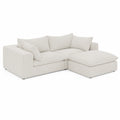 Sofá seccional de tela de pana crema con chaise longue