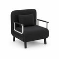 Sillón con estructura metálica y tapizado en poliéster negro
